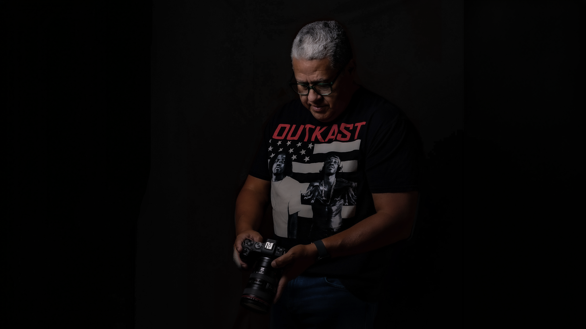 Mario Nunez holding a camera